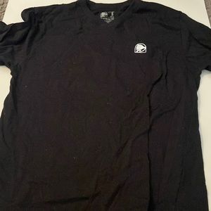 2 black Taco Bell shirts with detailing on the back, both are a mens Small